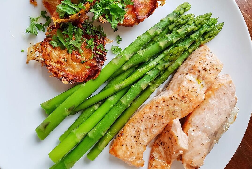 Grilled fish with asparagus in a low-carb diet menu